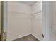 Walk-in closet featuring wire shelving providing good storage space at 1450 14Th St, Orange City, FL 32763