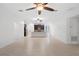 Spacious living room with tile flooring, offering plenty of space and a view of the kitchen area at 1480 Leitrim Loop, Apopka, FL 32703