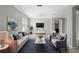 Inviting living room boasting comfortable seating, stylish decor, and plenty of natural light at 1480 Leitrim Loop, Apopka, FL 32703