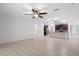 Spacious living room with tile flooring, offering plenty of space and a view of the kitchen area at 1480 Leitrim Loop, Apopka, FL 32703