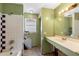 Bathroom featuring a tub/shower combo and a vanity needing repair at 1560 7Th Ave, Deland, FL 32724