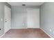 Bedroom featuring a carpeted floor, light gray walls and double door closet at 1560 7Th Ave, Deland, FL 32724