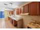 Kitchen featuring extended countertops, tile backsplash, and lots of cabinet space at 1560 7Th Ave, Deland, FL 32724