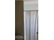 Bathroom featuring a toilet and a shower/tub combination with a shower curtain at 1626 S Page Dr, Deltona, FL 32725