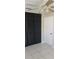 Bedroom with tile floor, ceiling fan, and black closet doors at 1626 S Page Dr, Deltona, FL 32725