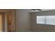 Cozy room featuring neutral paint, ceiling fan, and a bright window at 1626 S Page Dr, Deltona, FL 32725