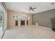 Living space with fireplace and views of the pool area at 1641 Timber Hills Dr, Deland, FL 32724