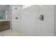A close up view of a shower showing gray walls and white tile at 1641 Timber Hills Dr, Deland, FL 32724