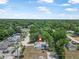 Aerial view of house nestled within a lush, green neighborhood at 1890 15Th St, Orange City, FL 32763