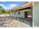 Comfortable back porch perfect for outdoor relaxation and enjoying the surrounding landscape at 1890 15Th St, Orange City, FL 32763