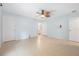 Spacious bedroom with tile flooring, ceiling fan, and ample natural light at 1890 15Th St, Orange City, FL 32763