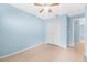 This bedroom offers generous closet space and a calming view at 1890 15Th St, Orange City, FL 32763