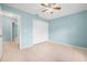 Empty bedroom featuring a closet and tile floors at 1890 15Th St, Orange City, FL 32763
