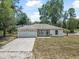 Charming one-story home with a two-car garage and well-maintained lawn at 1890 15Th St, Orange City, FL 32763