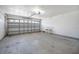 Spacious garage with high ceilings and an automatic garage door, ideal for storage and vehicles at 1890 15Th St, Orange City, FL 32763