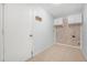 Bright laundry room with overhead cabinets and tile flooring at 1890 15Th St, Orange City, FL 32763