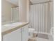 Bathroom with white vanity and a shower with curtain at 1922 Cove Point Rd, Port Orange, FL 32128