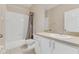 Bathroom featuring a shower-tub combo and a white vanity at 1922 Cove Point Rd, Port Orange, FL 32128