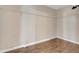 Walk in closet with hardwood floors and shelving at 1922 Cove Point Rd, Port Orange, FL 32128