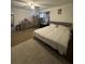 Comfortable bedroom featuring a bed, dresser, and carpeted floors, creating a cozy retreat at 2219 Howland Blvd, Deltona, FL 32738