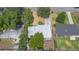 An aerial shot showcasing the house and surrounding yard and neighborhood at 2327 Mulbry Dr, Winter Park, FL 32789