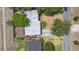 An aerial shot showcasing the house and surrounding yard and neighborhood at 2327 Mulbry Dr, Winter Park, FL 32789