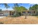 Charming single-story home featuring an attached garage and well-kept front yard at 2327 Mulbry Dr, Winter Park, FL 32789