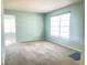 Bright living room with carpet and large window at 2332 Hadley St, Deltona, FL 32738