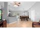 An eat-in kitchen flows into a dining space, creating a natural transition between spaces at 2416 Candlewick St, Deltona, FL 32738