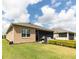 Backyard featuring a patio area and green lawn space at 2435 Pawtucket Pass, Mount Dora, FL 32757