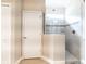 Clean bathroom features a glass enclosed shower at 2435 Pawtucket Pass, Mount Dora, FL 32757