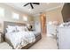 Inviting bedroom featuring neutral tones and ample space at 2435 Pawtucket Pass, Mount Dora, FL 32757