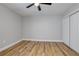 Bedroom with wood flooring, closet and ceiling fan at 245 Rosita Dr, Debary, FL 32713