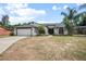 Charming single-Gathering home featuring a well-kept lawn and landscaping at 245 Rosita Dr, Debary, FL 32713