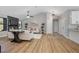 Open-concept living and dining area with hardwood floors and a modern design at 245 Rosita Dr, Debary, FL 32713