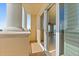 Condo balcony with a view of the living space through sliding glass doors, ocean in background at 2515 S Atlantic Ave # 1001, Daytona Beach Shores, FL 32118