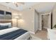 Bedroom features neutral colors, a closet, and an ensuite bathroom at 2515 S Atlantic Ave # 1001, Daytona Beach Shores, FL 32118