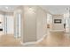 Inviting hallway boasts tiled flooring, neutral paint and views through to the exterior at 2515 S Atlantic Ave # 1001, Daytona Beach Shores, FL 32118