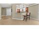 Stylish kitchen with granite countertops and bar seating, providing a perfect spot for entertaining and casual dining at 2515 S Atlantic Ave # 1001, Daytona Beach Shores, FL 32118