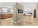 Bright living room featuring tile floors, recessed lighting, and a serene coastal-themed painting at 2515 S Atlantic Ave # 1001, Daytona Beach Shores, FL 32118
