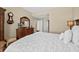 Main bedroom showcases a comfortable bed, with doorways visible at 2515 S Atlantic Ave # 1001, Daytona Beach Shores, FL 32118