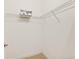 Carpeted walk-in closet with wire shelving offers ample storage at 2515 S Atlantic Ave # 1001, Daytona Beach Shores, FL 32118