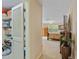 View of a bedroom featuring a walk-in closet with ample storage shelving and a large window at 2551 Cross Country Dr, Port Orange, FL 32128