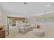 Expansive main bedroom featuring a sitting area, and neutral tones, creating a relaxing and inviting retreat at 2551 Cross Country Dr, Port Orange, FL 32128