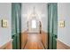 Hallway leading to bath with classic design and modern shower at 257 Huntington Dr, Deland, FL 32724