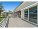 Wide patio overlooking manicured lawn and waterfront at 2636 S Peninsula Dr, Daytona Beach, FL 32118