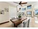 Dining area featuring view of the great room, staircase and access to the backyard at 2636 S Peninsula Dr, Daytona Beach, FL 32118