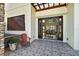 Inviting entryway featuring tile flooring, a seating area, and beautiful views through the front doors at 2636 S Peninsula Dr, Daytona Beach, FL 32118