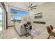 Bright living area with stone accent wall, fireplace, and large windows at 2636 S Peninsula Dr, Daytona Beach, FL 32118