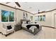 Bright main bedroom with two sitting areas, and large windows offering a view of the outside at 2636 S Peninsula Dr, Daytona Beach, FL 32118